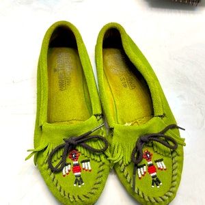 Bright green Minnetonka Moccasins.